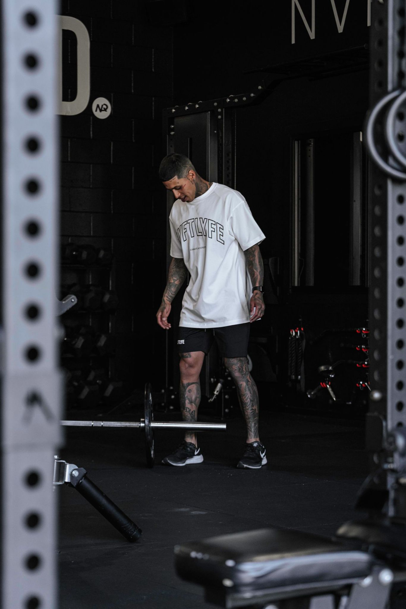 Athlete in a private studio, low-lit gym interior